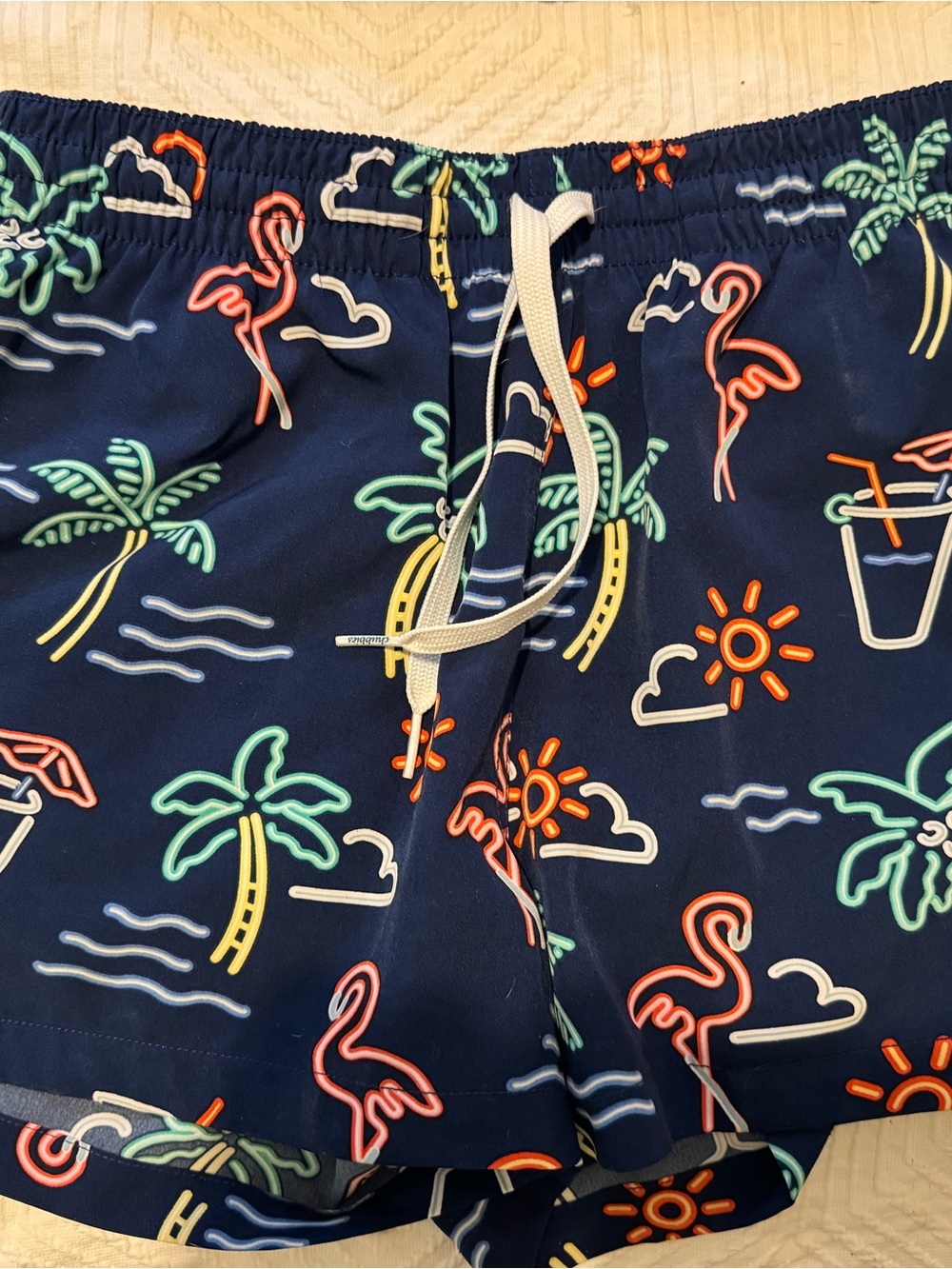 chubbies Navy Tropical Neon Flamingo Swim Trunks